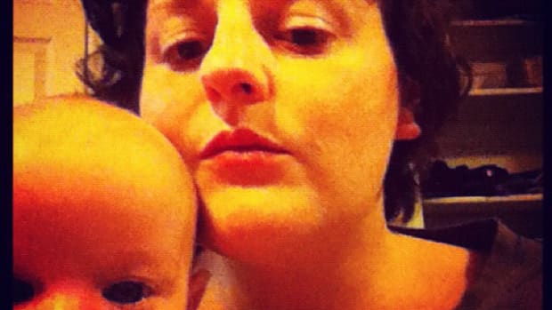 The author without makeup (new resolution?) with a completed 2011 resolution (have a baby)