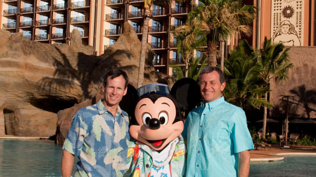 Tom Staggs, Mickey Mouse, and Bob Iger