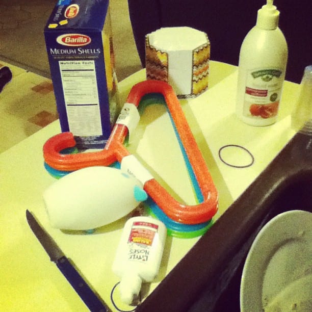 A real, unstaged, untouched picture of my actual messy kitchen counter (including the hangars that are going to make my kids' closets more organized. ahem.)