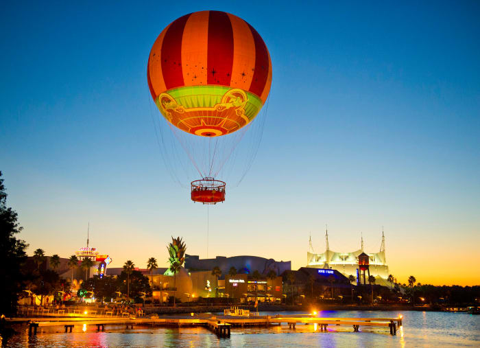 A new Characters in Flight balloon is now soaring above Downtown Disney in Lake Buena Vista, Fla. The tethered helium balloon features a fresh design, including a red, yellow and blue color scheme, adorned with a new set of flying characters: Tinker Bell, Peter Pan, Buzz Lightyear, Dumbo, Jasmine and Aladdin. From 400 ft. up in the air, guests get a breathtaking 360-degree view of Walt Disney World Resort for approximately 8 – 10 minutes. The daily hours of operation are 8:30 a.m. to midnight, weather permitting. (Gene Duncan, photographer)