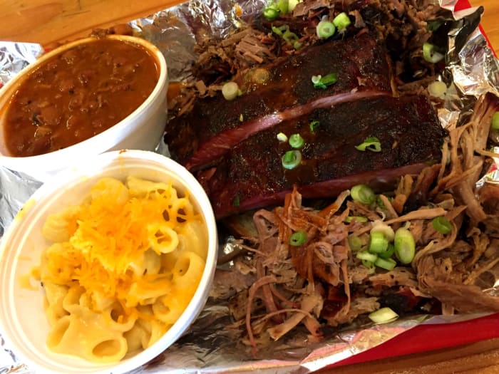 Ribs, brisket, pulled pork, beans, and mac and cheese at Rollin Smoke Barbeque (Photo: Brandi Sjostrom)
