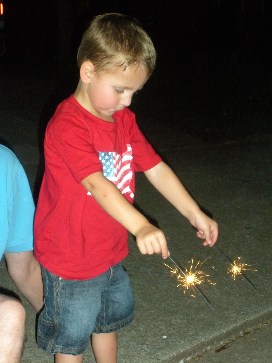 boy with sparklers
